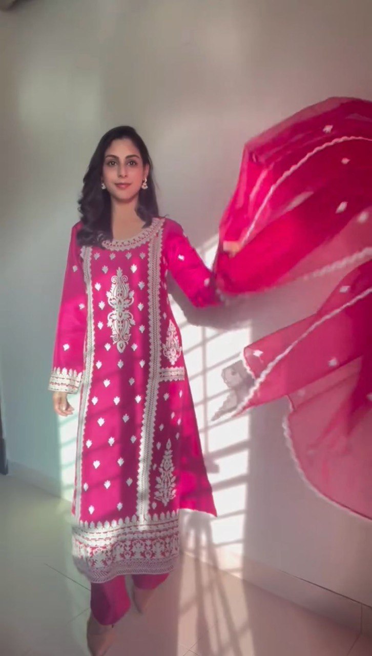 Elegant traditional outfit in vibrant red and timeless black contrast
