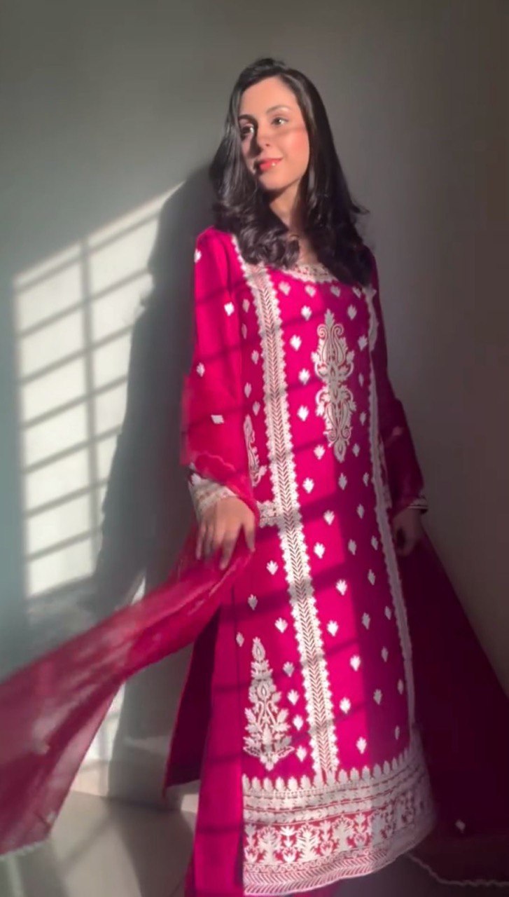 Elegant traditional outfit in vibrant red and timeless black contrast