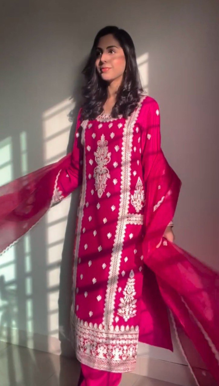 Elegant traditional outfit in vibrant red and timeless black contrast
