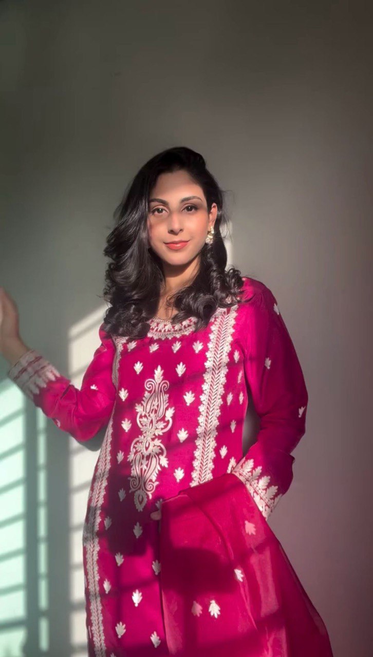 Elegant traditional outfit in vibrant red and timeless black contrast