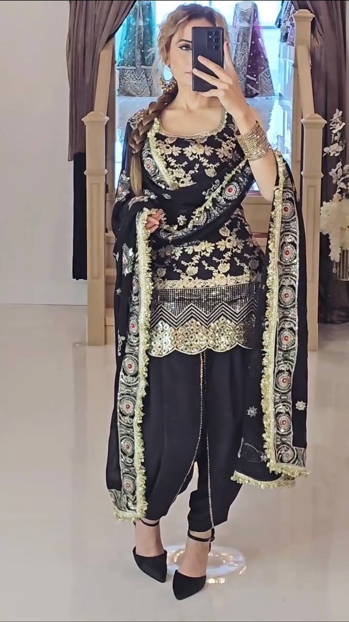 A Patiala-style salwar, known for its pleats and comfort, in matching black fabric with subtle embellishments