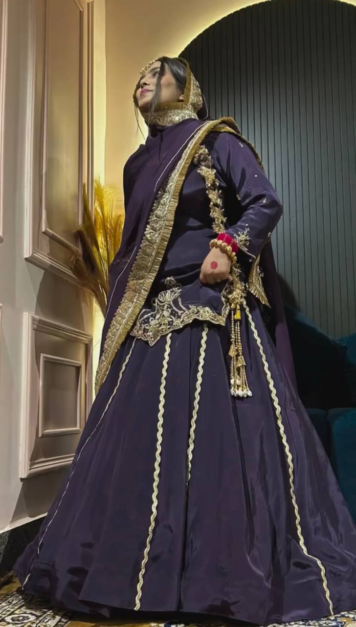 "Majestic Midnight Attire with Golden Embellishments for Royal Charm"