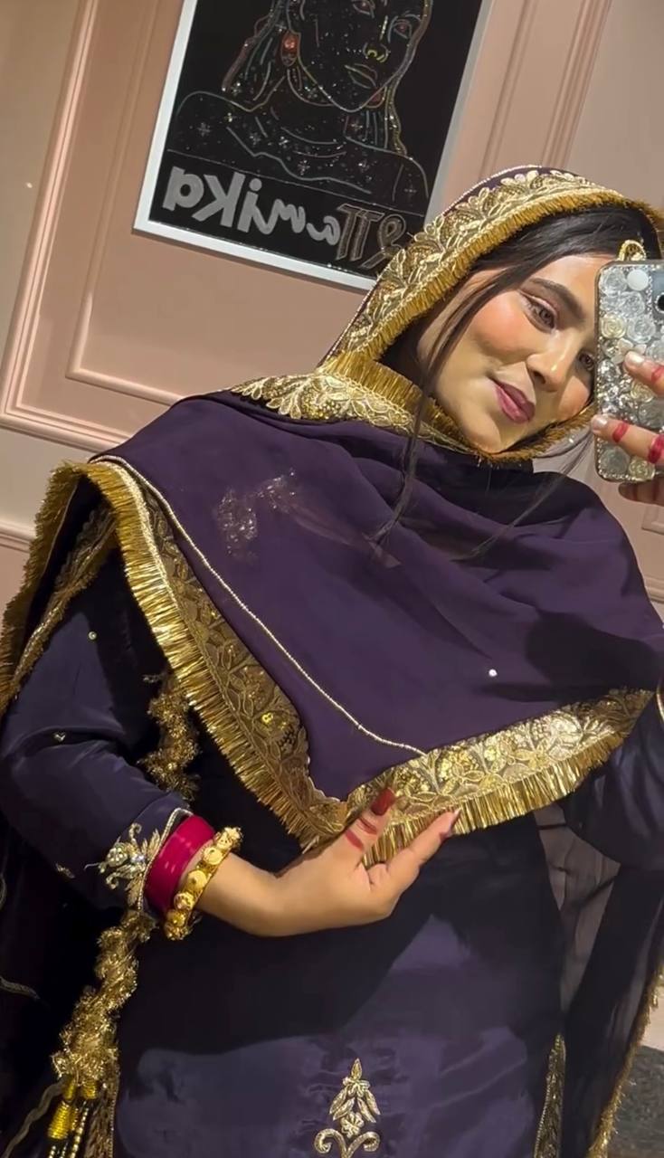 "Majestic Midnight Attire with Golden Embellishments for Royal Charm"