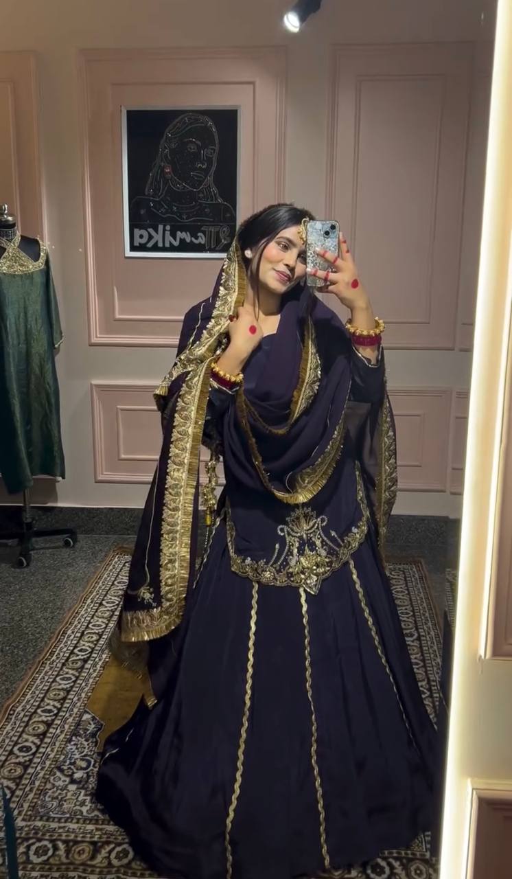 "Majestic Midnight Attire with Golden Embellishments for Royal Charm"