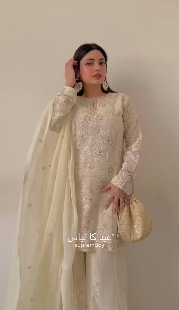 "Elegant Ivory Ensemble for Eid – Grace, Glamour, and Tradition Unite"