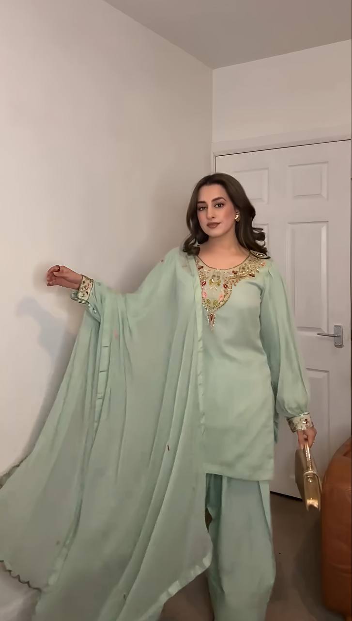"Graceful Glamour: Timeless Ethnic Elegance in Pastel and Black Hues"