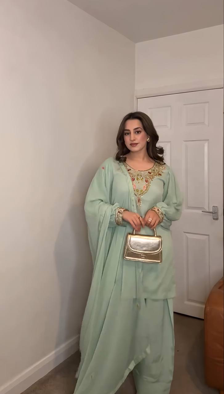 "Graceful Glamour: Timeless Ethnic Elegance in Pastel and Black Hues"