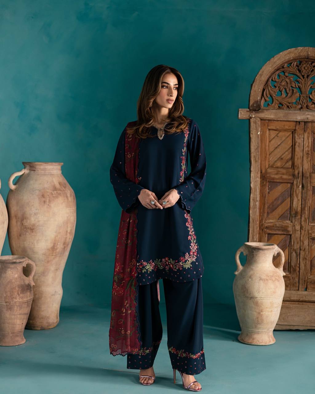 Timeless Grace: Navy Suit with Luxurious Red and Gold Embellishments