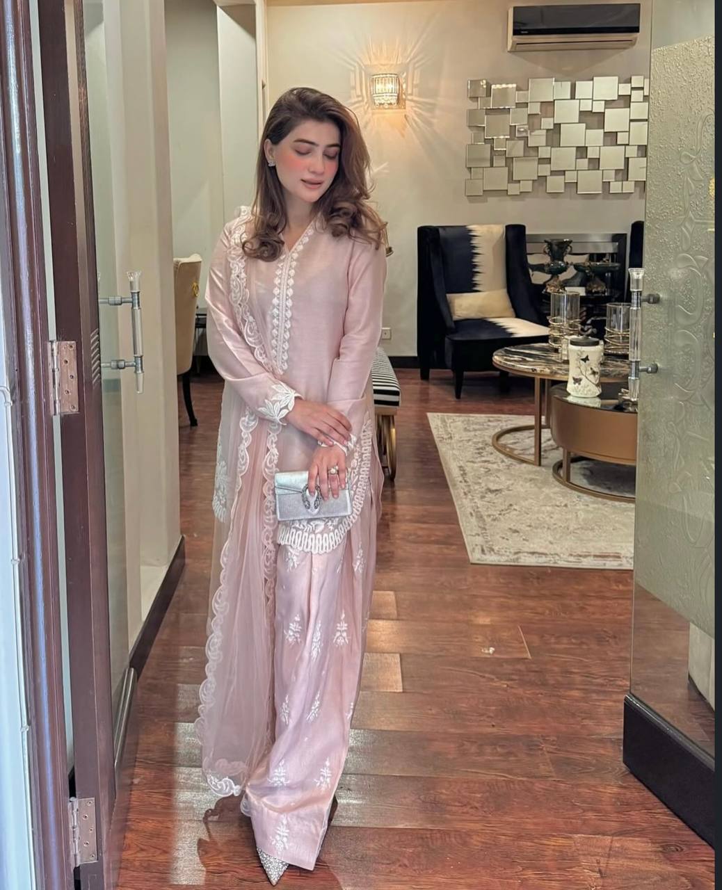 Chic Confidence: Embracing Style and Grace in a Striking Pink Ensemble