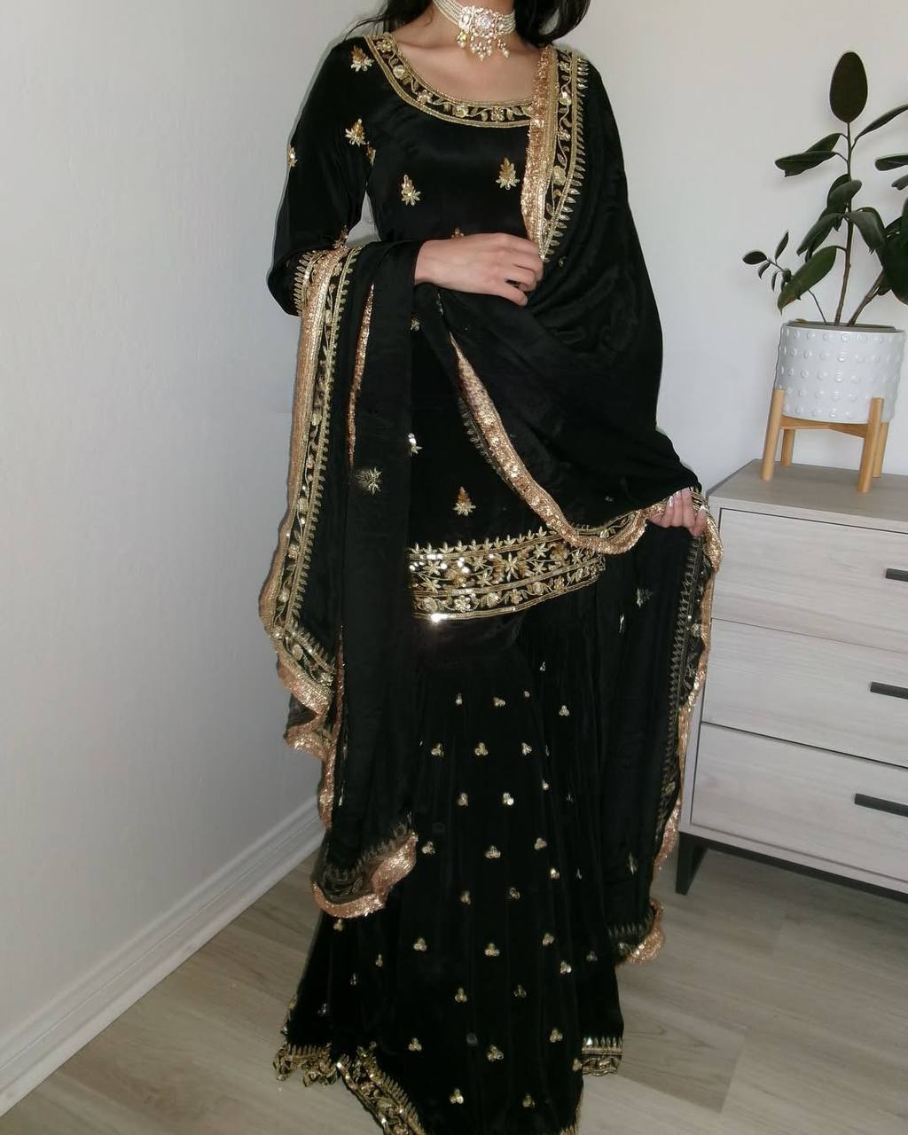 Elegance in Black and Gold: A Captivating Fashion Statement