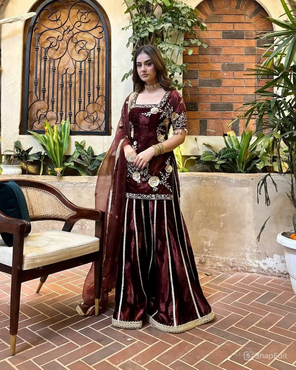 Graceful Maroon Sharara Adorned with Golden Floral Patterns