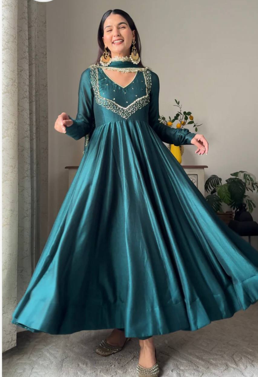 Graceful Teal Anarkali Suit with Ornate Detailing and Flowing Dupatta