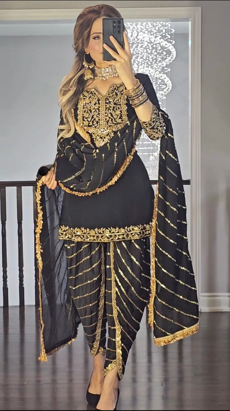 "Black and Gold Dhoti Patiyala Suit with Intricate Embroidery"