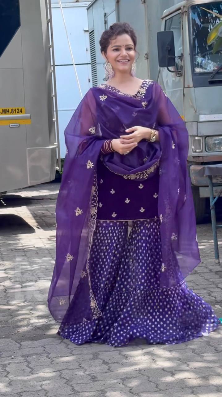 Regal Elegance: Purple Sari with Golden Embroidery