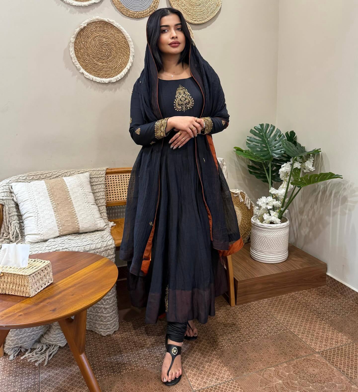 Elegance Unveiled A Woman in Timeless Black Attire