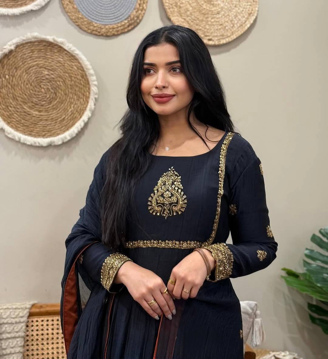 Elegance Unveiled A Woman in Timeless Black Attire