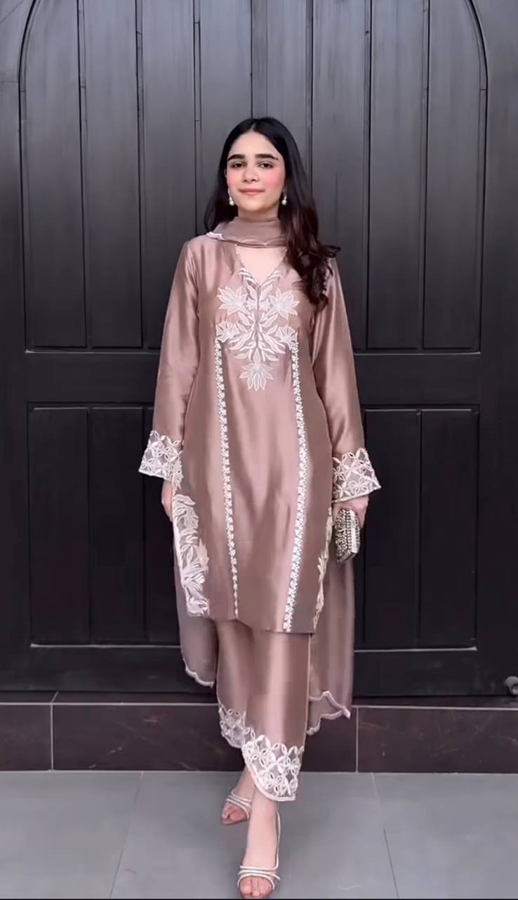 Luxurious Brown Suit Adorned with Intricate Lace