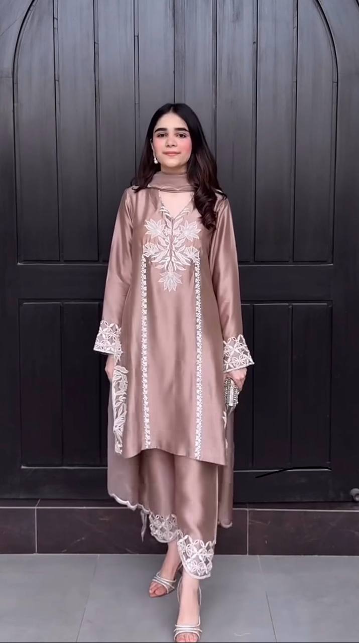 Luxurious Brown Suit Adorned with Intricate Lace