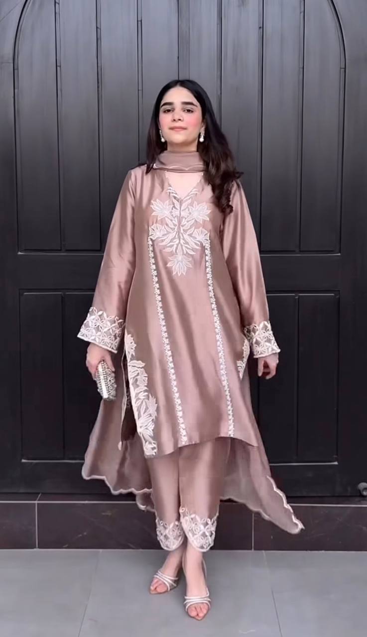 Luxurious Brown Suit Adorned with Intricate Lace