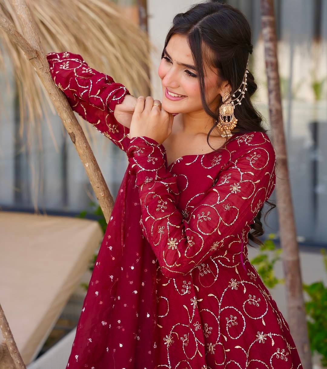Luxe Serenity: Woman in Maroon by Water