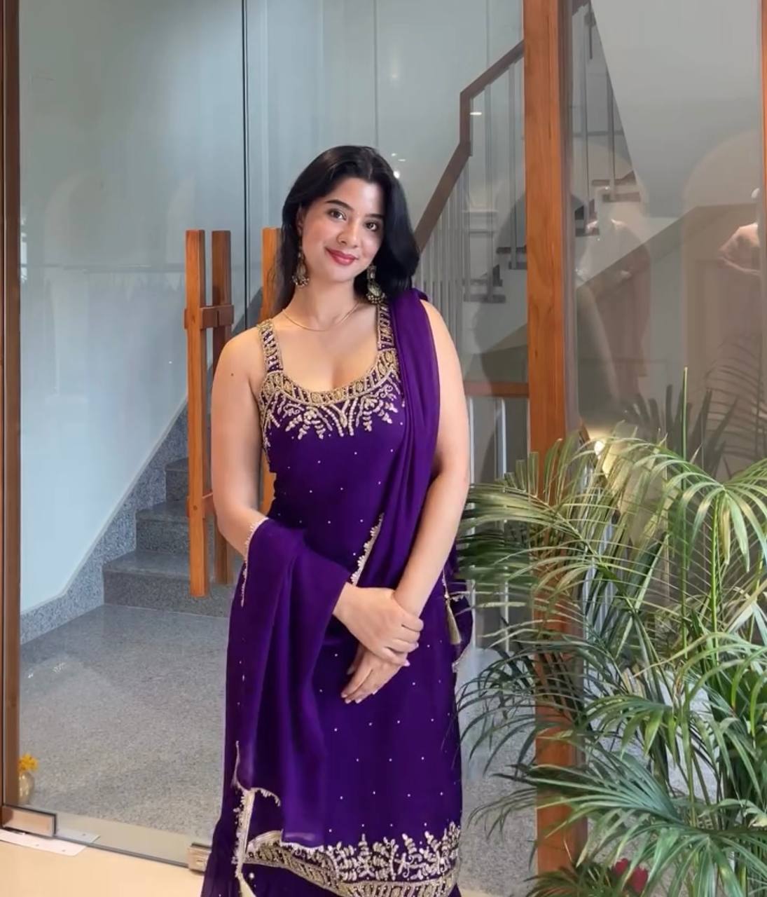 Anusha Patel Elegance in Purple and Red Attire
