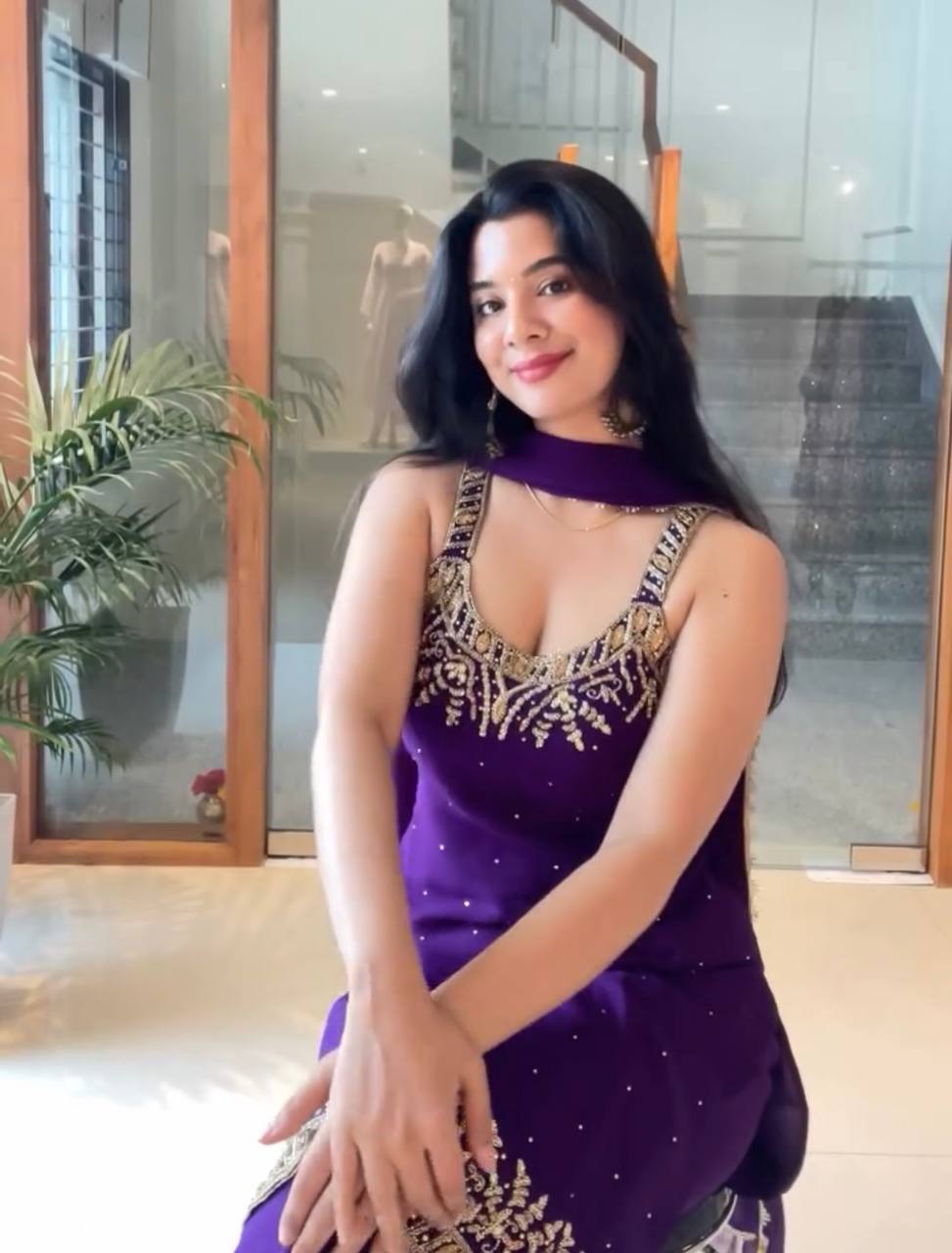 Anusha Patel Elegance in Purple and Red Attire
