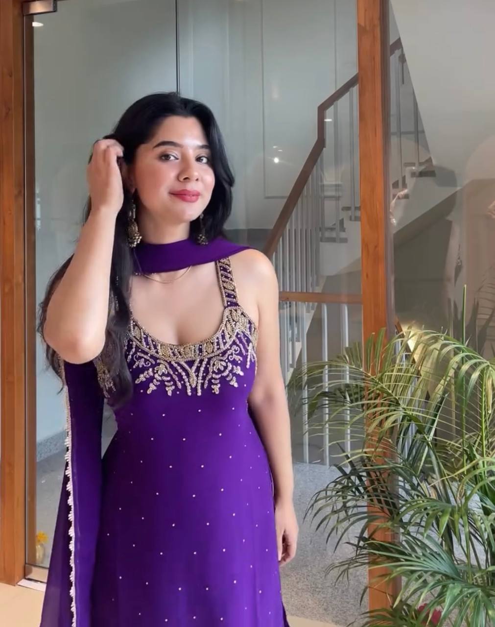Anusha Patel Elegance in Purple and Red Attire