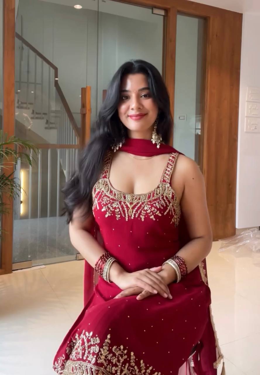 Anusha Patel Elegance in Purple and Red Attire