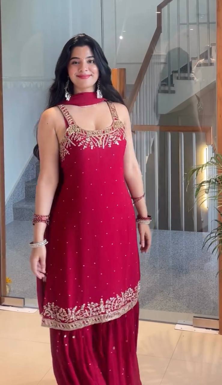 Anusha Patel Elegance in Purple and Red Attire
