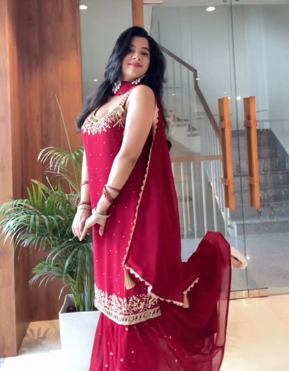 Anusha Patel Elegance in Purple and Red Attire