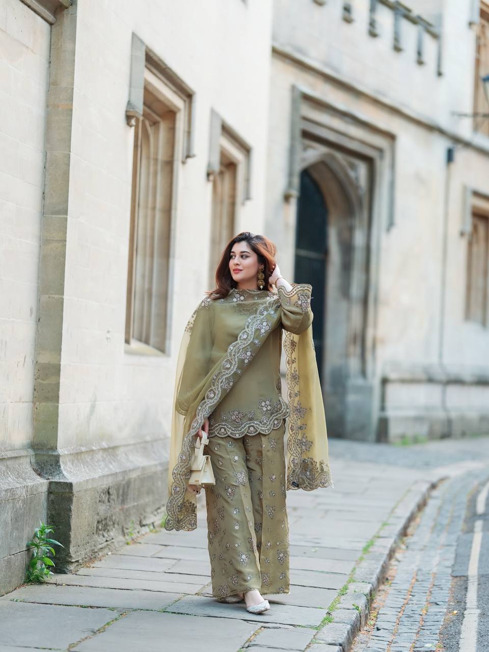 Enchanted Elegance: A Lady in Green Adorning the Wall