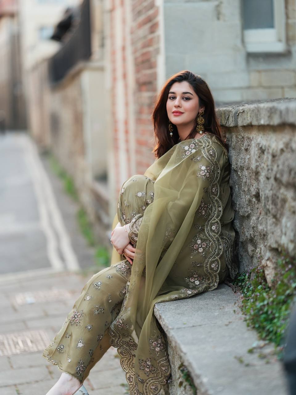 Enchanted Elegance: A Lady in Green Adorning the Wall