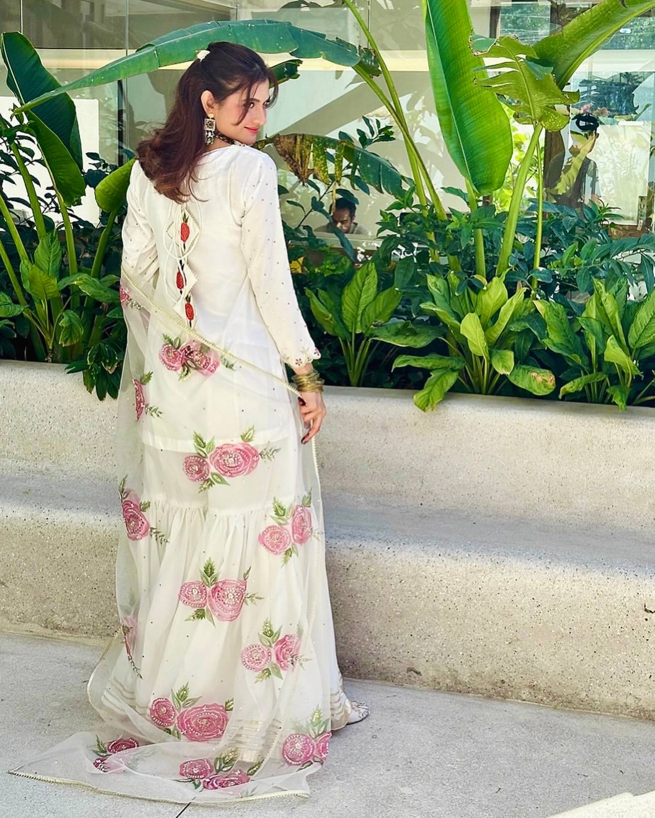 Elegant Blossom: White Embroidered Suit Adorned with Pink Petals