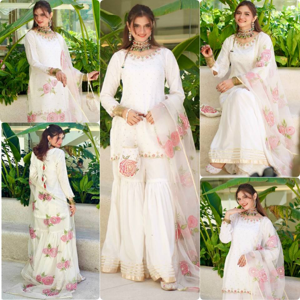 Elegant Blossom: White Embroidered Suit Adorned with Pink Petals