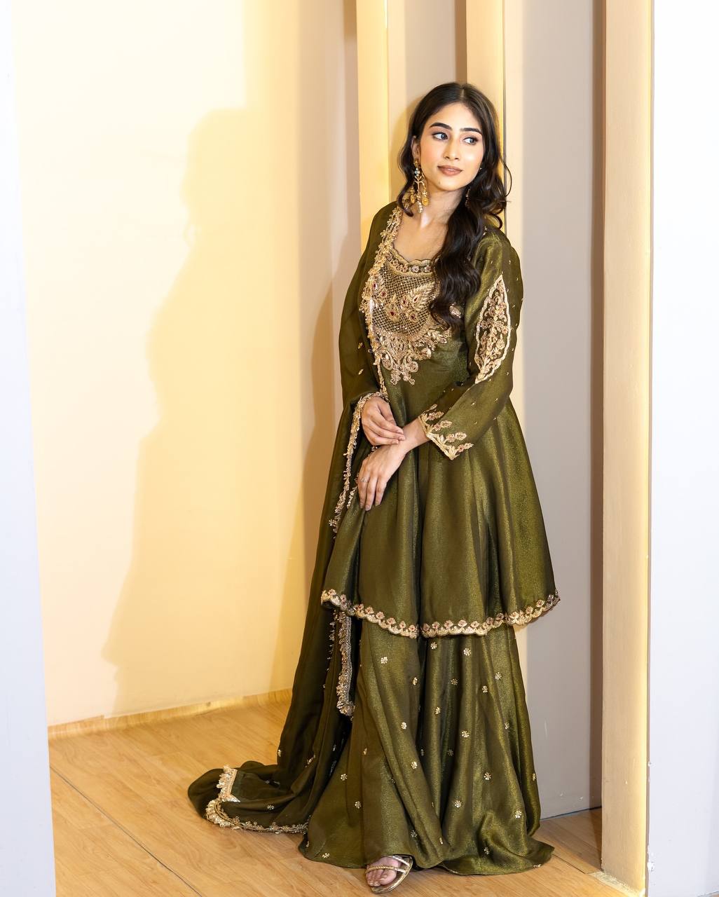 Timeless Grace: Woman in Green Dress Radiates Captivating Charm