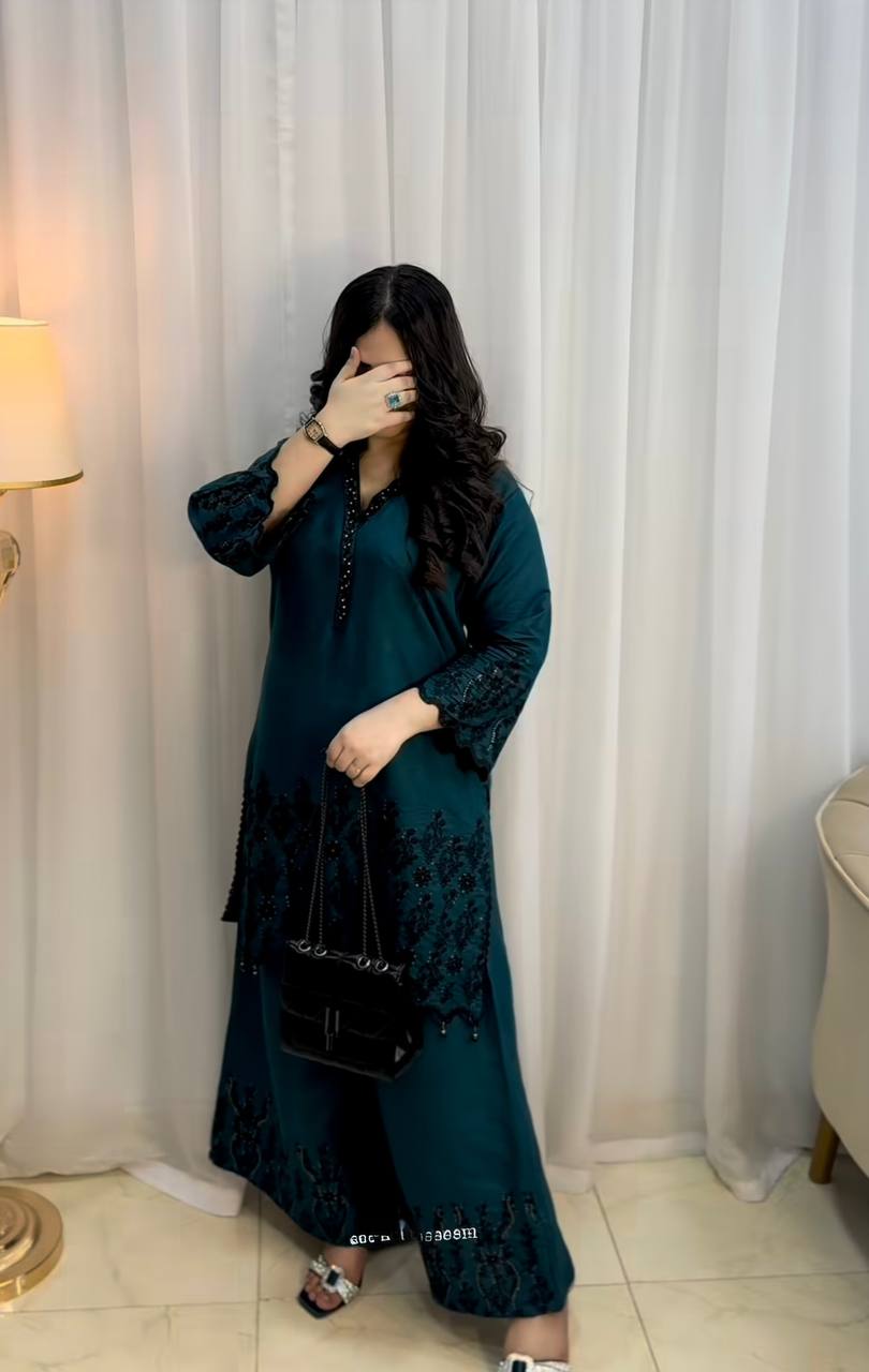 Verdant Opulence: Luxurious Green Suit Adorned with Black Embellishments