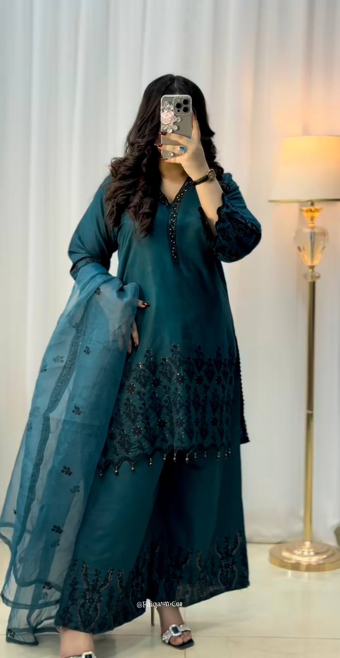 Verdant Opulence: Luxurious Green Suit Adorned with Black Embellishments