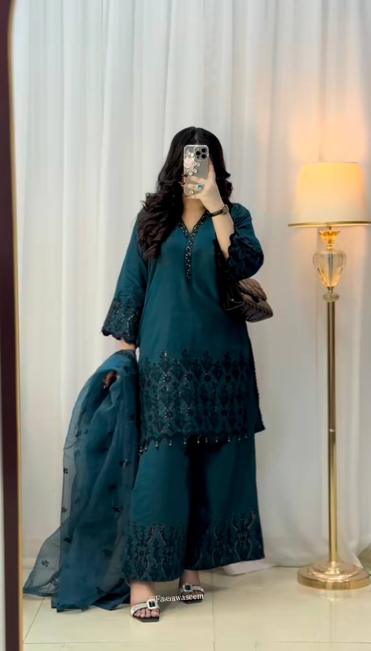 Verdant Opulence: Luxurious Green Suit Adorned with Black Embellishments