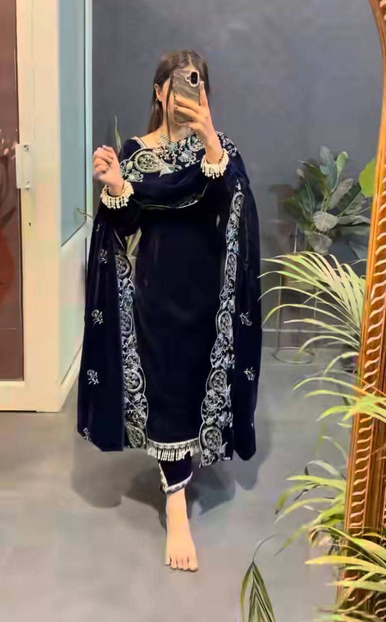 “Elegance Draped in Midnight Blue Velvet Grace”