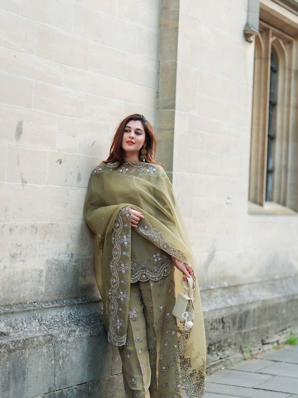 Enchanted Elegance: A Lady in Green Adorning the Wall
